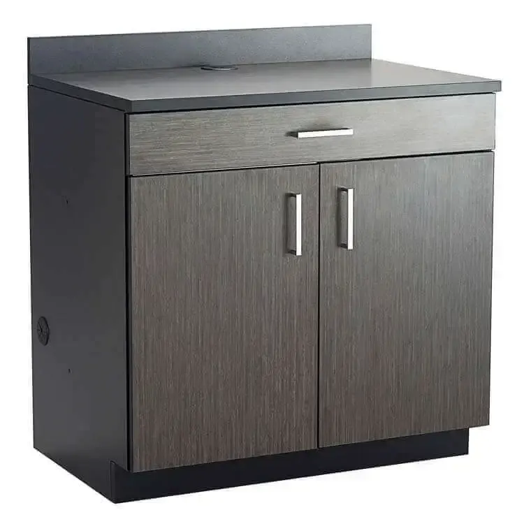 Freestanding laminate base cabinet with grey woodgrain doors and a dark grey top
