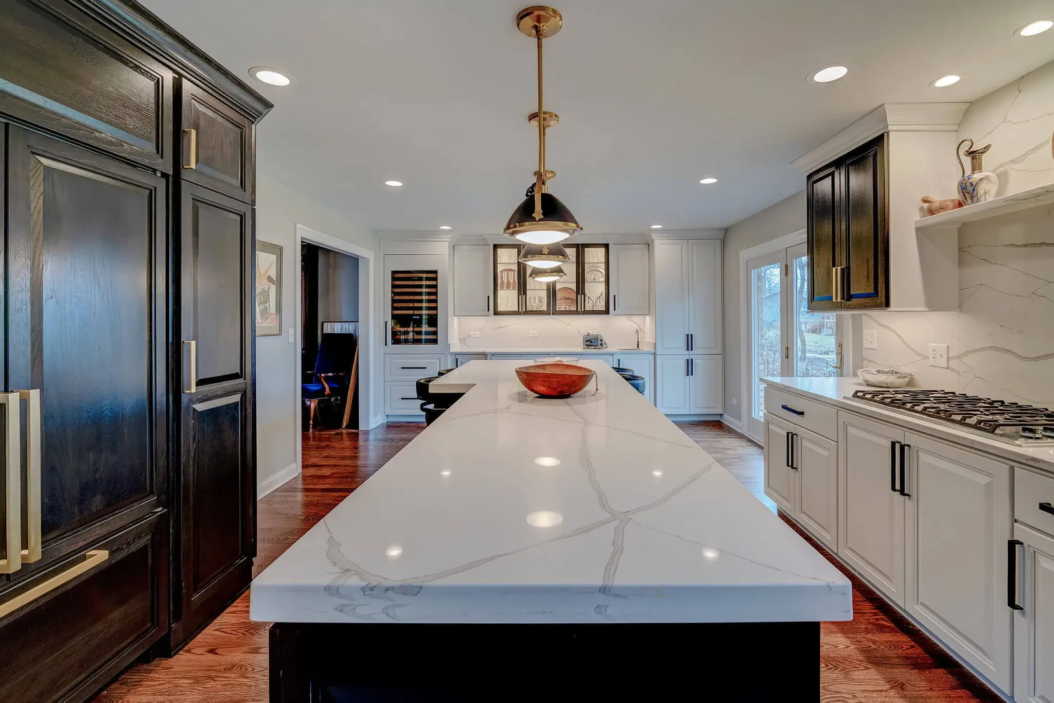 Modern kitchen showcasing custom quartz countertop by NuForm Counter Top Company Inc.
