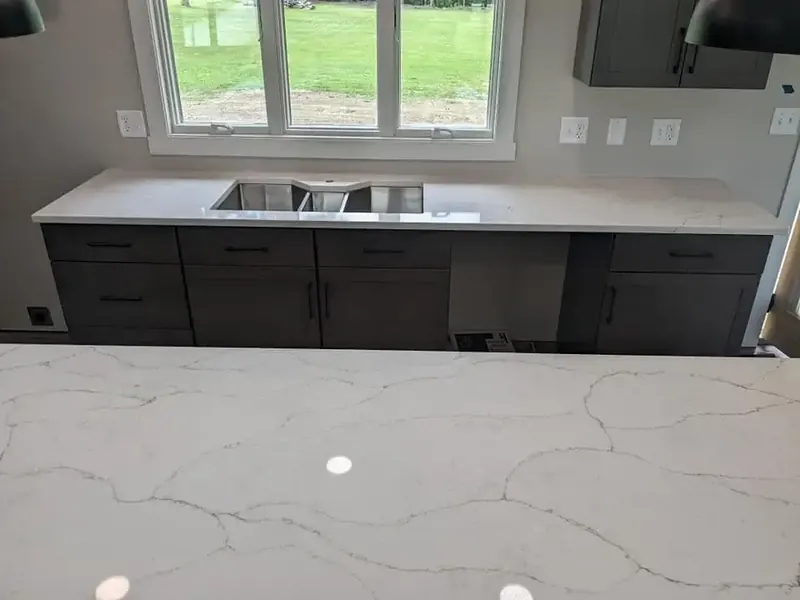 Quartz kitchen surface with undermount sink