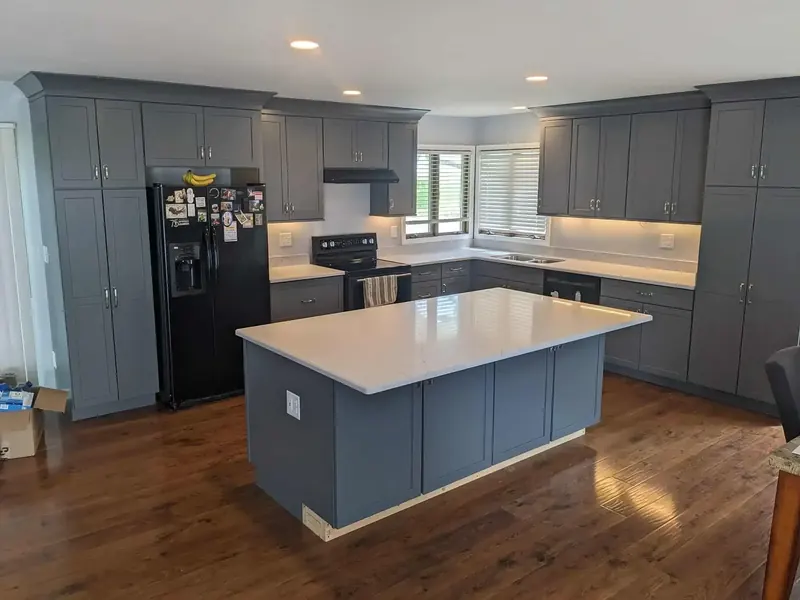 Stylish quartz countertop with subway tile backsplash