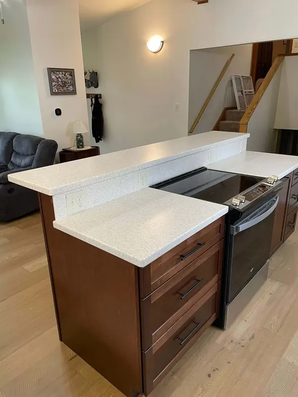 Sleek solid surface countertop with modern fixtures